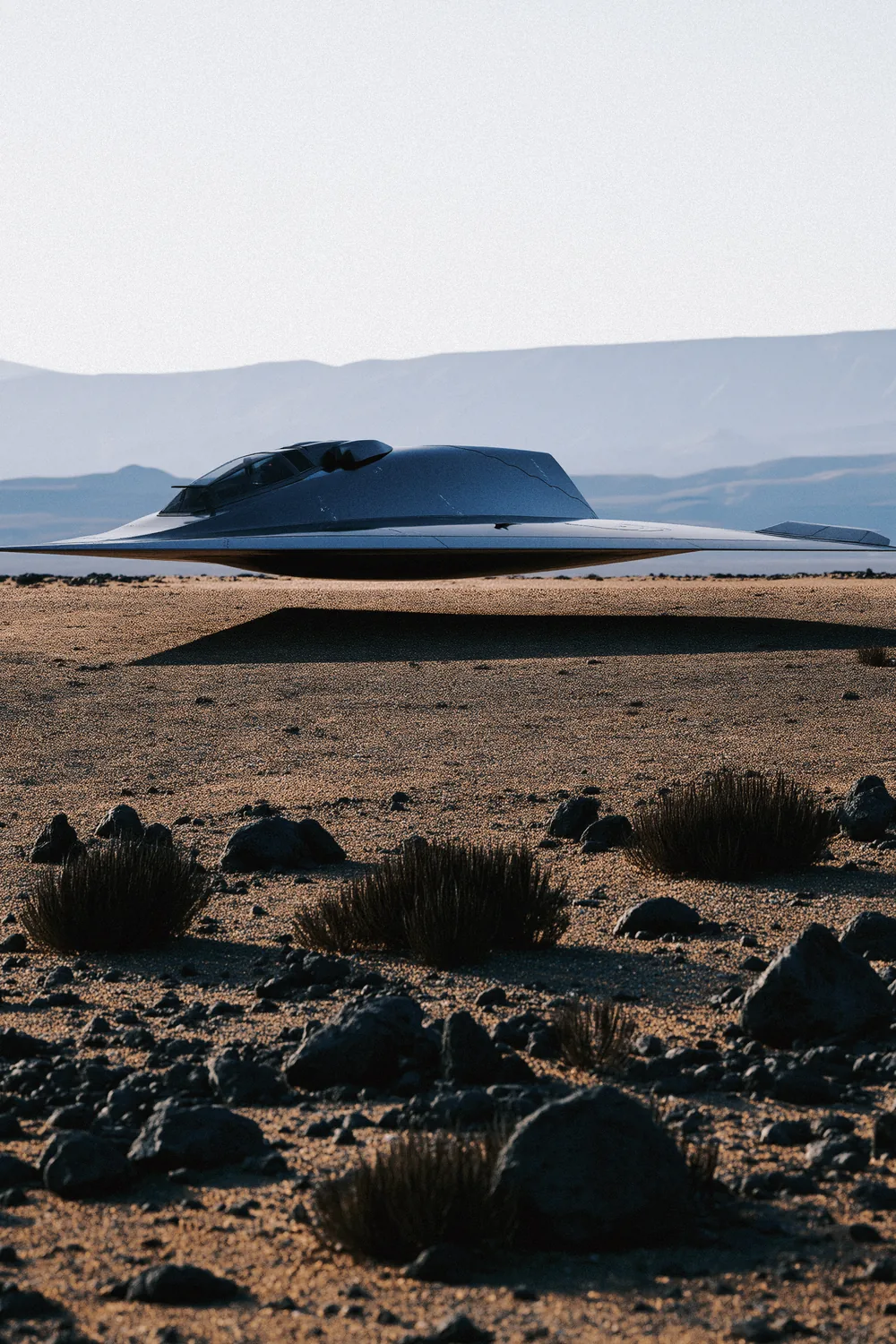 The FS-45 on a plain of rock and dust, mountains behind it.